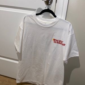 Pacific Sunwear racing tee shirt from PacSun. Size Large.
